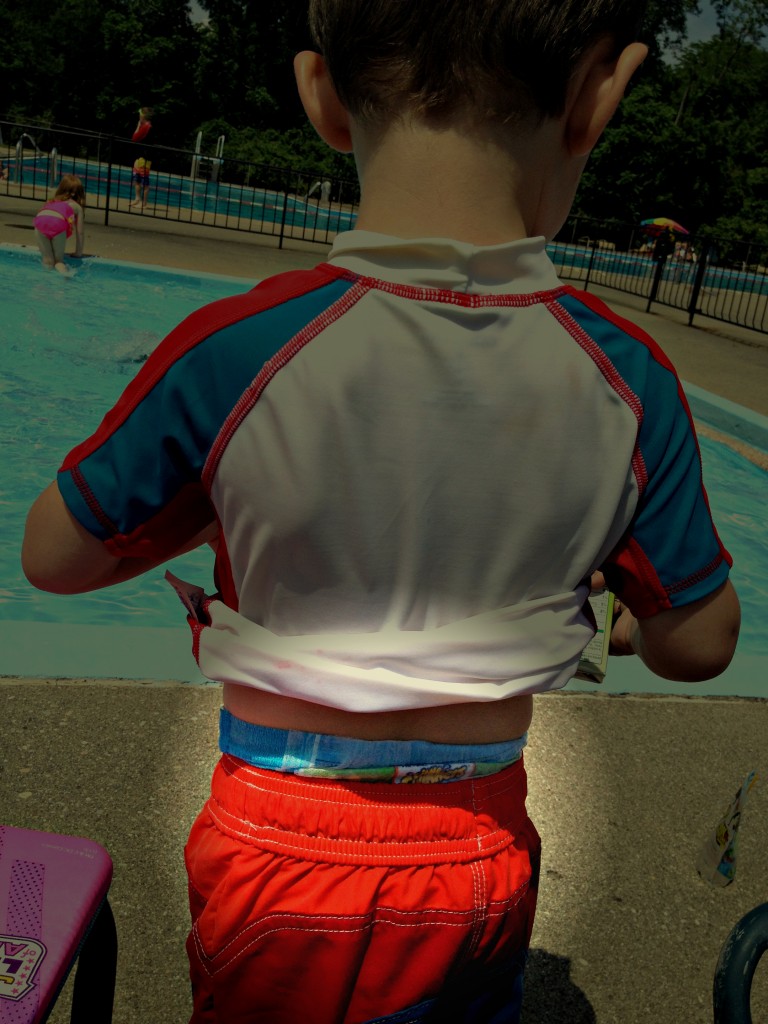 He likes to wear them above his swim trunks so everyone knows he's got something special on underneath...